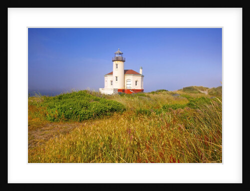 Morning light adds beauty to fog and Coquille River Lighthouse, Bandon, Oregon Coast, Pacific Ocean, by Anonymous