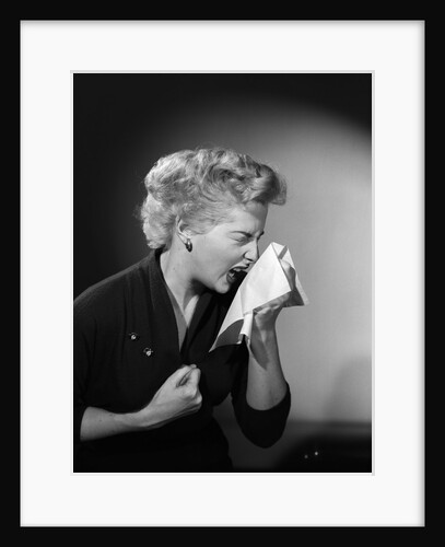 1950s woman sneezing cold by Anonymous