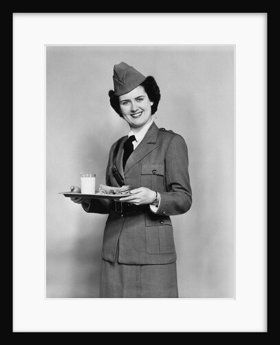 1940s army woman with lunch tray with a glass of milk and sandwich by Anonymous