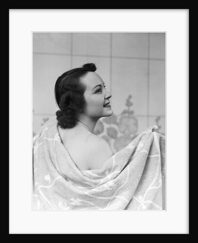 1930s brunette woman drying back with towel by Anonymous