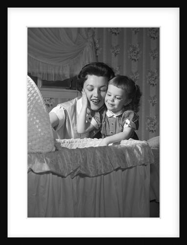 1950s mother & daughter admiring baby in bassinet by Anonymous