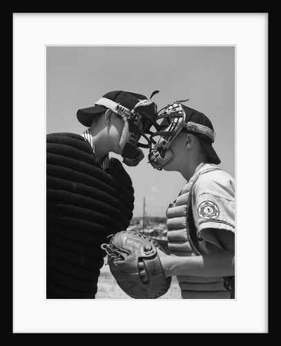 1950s boys in baseball uniforms face to face arguing umpire & catcher by Anonymous