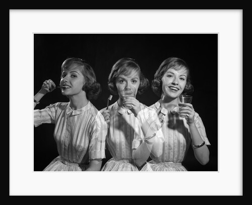 1950s 1960s multiple exposure woman brushing teeth by Anonymous