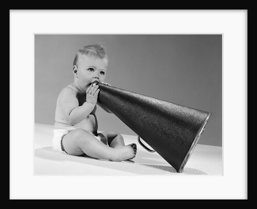 1960s baby in diaper seated holding megaphone by Anonymous