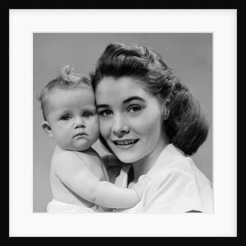 1940s 1950s portrait of mother hugging baby looking at camera by Anonymous