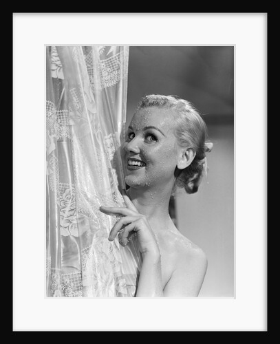 1950s portrait of wet blonde peeking around shower curtain by Anonymous