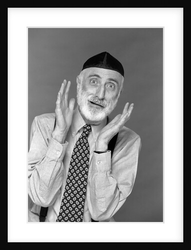 1990s character portrait man gray beard wearing yarmulke hebrew jewish skullcap hands up to face gesture funny expression oy looking at camera by Anonymous
