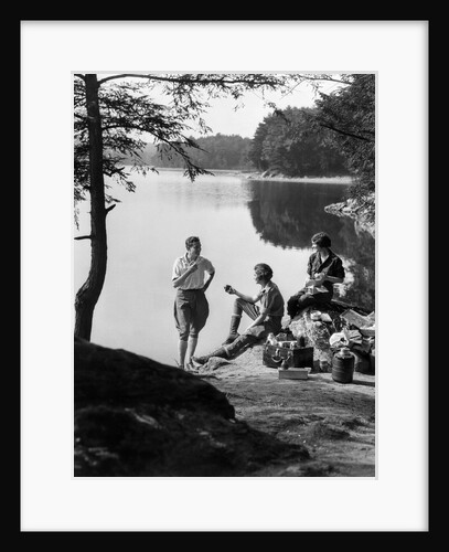 1920s 1930s 3 people picnicking by onata lake man wearing jodhpurs standing two seated women berkshires ma usa by Anonymous