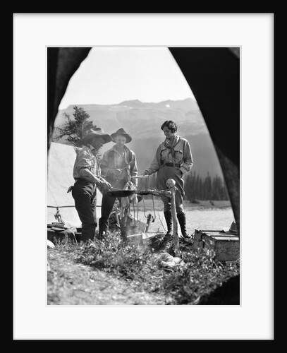 1930s campsite bow lake alberta canada 2 men 1 woman standing around campfire by Anonymous