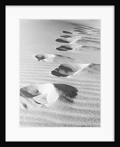 1950s footsteps in sand dunes by Anonymous