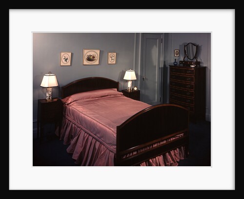 1930s 1940s bedroom double bed with pink satin bedspread by Anonymous