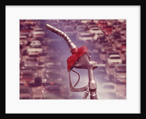 1970s nozzle of gasoline pump with traffic background by Anonymous