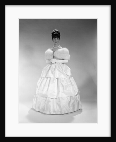 1960s pretty young woman wearing tiara fur stole and string of pearls by Anonymous