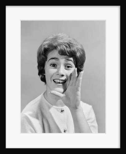 1950s woman yelling with hand held up to her face by Anonymous
