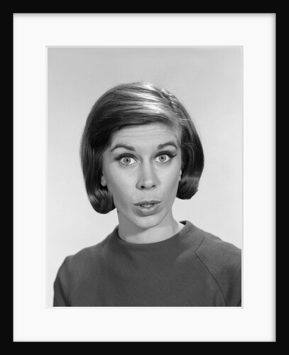 1960s woman portrait looking at camera asking question wonder puzzled funny face expression by Anonymous