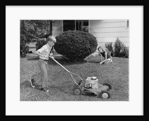 1970s brother and sister doing chores mowing lawn cutting grass yard work together by Anonymous