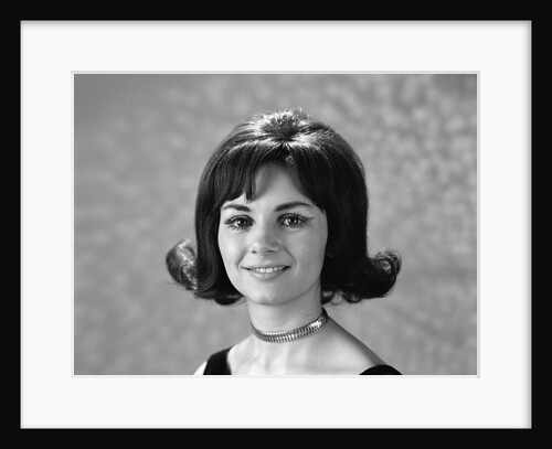 1960s 1970s portrait smiling brunette woman flip hair style with bangs looking at the camera by Anonymous