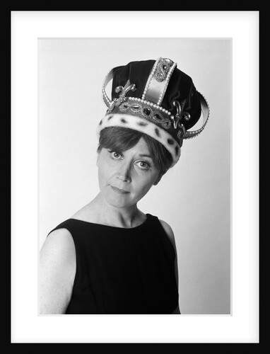 1970s portrait woman wearing queen's crown looking at camera by Anonymous