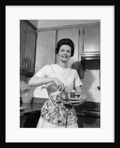 1960s woman kitchen housewife stir by Anonymous