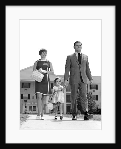 1960s 1970s family taking a walk sidewalk by Anonymous