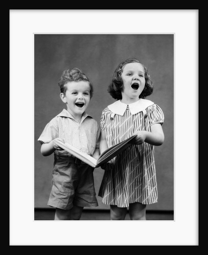 1930s two children standing singing by Anonymous