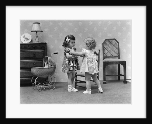 1940s two girls playing with dolls by Anonymous