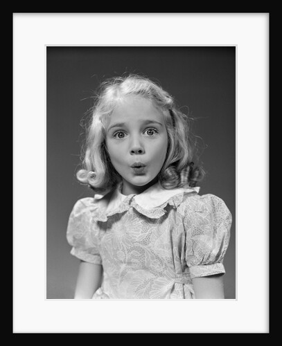 1940s 1950s blond girl whistling lips puckered eyes wide open looking at camera by Anonymous