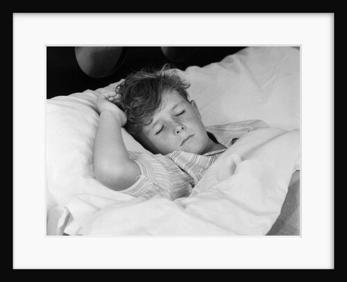 1940s 1950s boy sleeping in bed by Anonymous