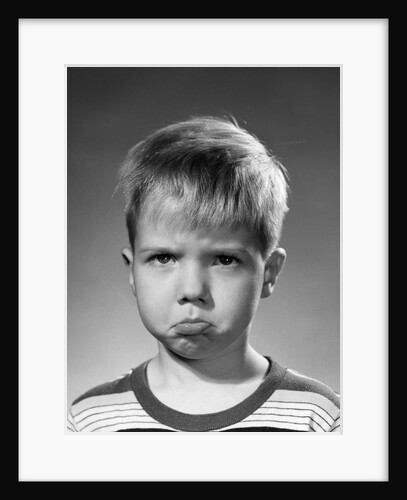 1950s portrait blond boy sad grumpy angry pouting facial expression looking at camera by Anonymous