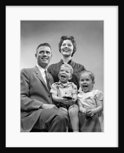 1950s family smiling posing together by Anonymous