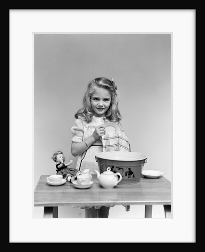 1940s child little girl and doll drying washing toy dishes by Anonymous