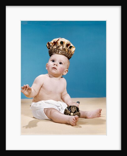 1960s baby wearing cloth diaper and crown holding a scepter by Anonymous