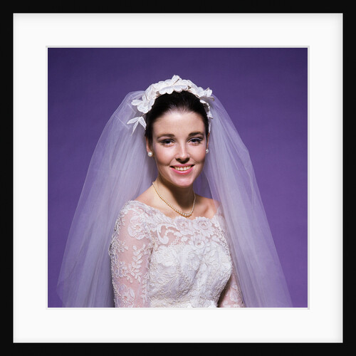 1960s young woman bride portrait bridal veil head shoulders smiling pearls by Anonymous