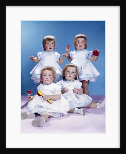 1950s 1960s quadruplet portrait 4 red haired girls wearing dresses two seated 2 standing by Anonymous