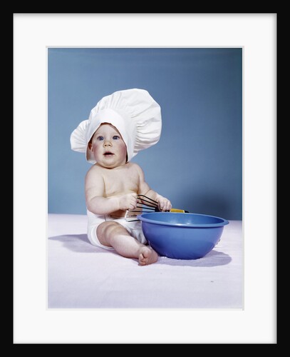 1950s 1960s baby wearing chef hat toque holding spatula blue mixing bowl by Anonymous