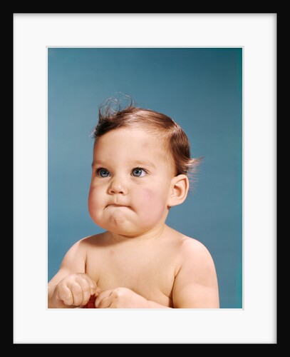 1960s baby portrait serious facial expression by Anonymous