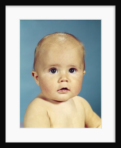 1960s portrait adorable sincere baby looking at camera by Anonymous
