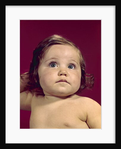 1960s portrait chubby cheeks big eyes brunette baby girl by Anonymous