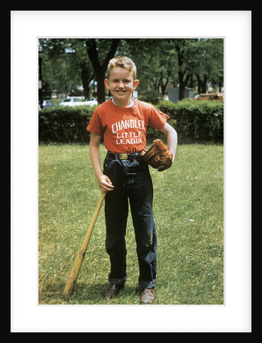 1950s 1958 little boy outside with baseball bat and glove looking at camera by Anonymous