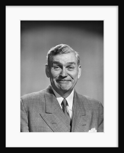 1950s mature middle aged man smiling business suit tie happy amused funny face expression by Anonymous