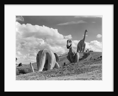 1950s dinosaur park south dakota three dinosaur statues on hillside by Anonymous