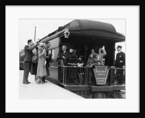 1930s family with grandparents & conductor on broadway limited observation car train platform waving goodbye & farewell by Anonymous