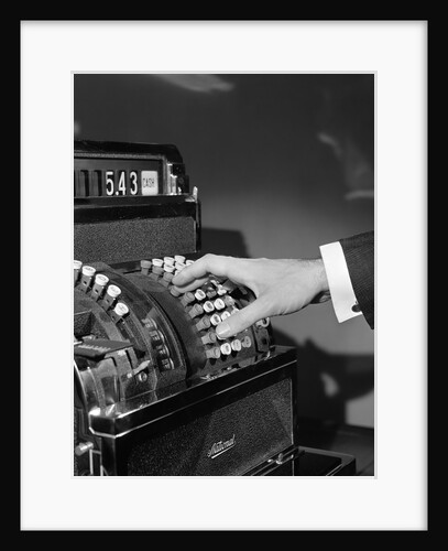1930s 1940s man's hand pushing price buttons on cash register by Anonymous