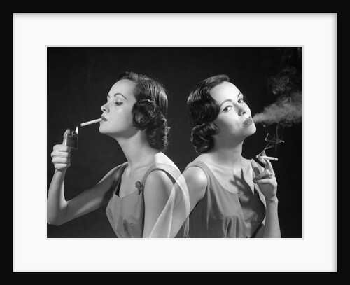 1960s multiple exposure two views brunette woman smoking a cigarette lighting it and exhaling smoke by Anonymous