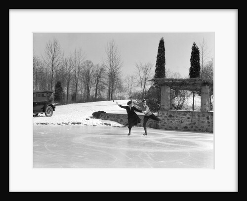 1920s couple man woman ice skating on outdoor rink with car nearby skating side by side by Anonymous