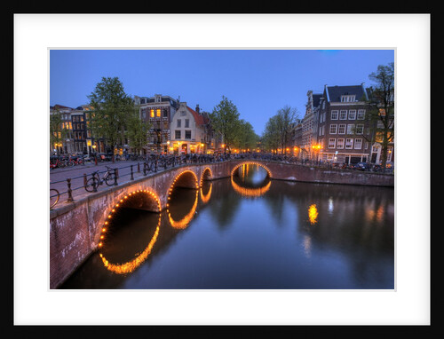 Evening light old buildings and bridge along the many Canals of Amsterdam, Netherlands by Anonymous