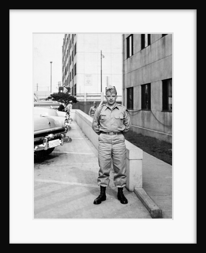 US army soldier poses for a photo on base, ca. 1954. by Anonymous