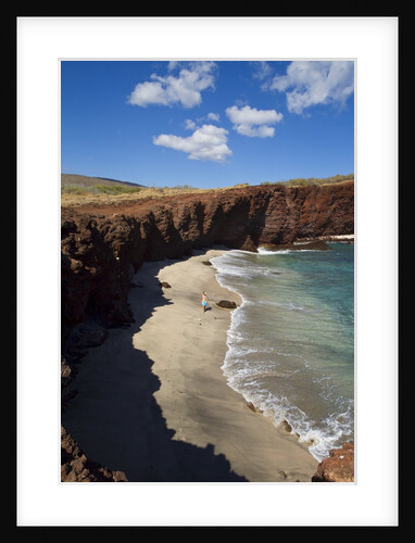 Woman walking on beach at Shark's cove, Lanai, Hawaii by Anonymous