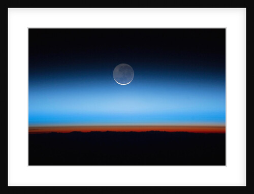 Crescent moon photographed from orbit aboard the International Space Station by Anonymous
