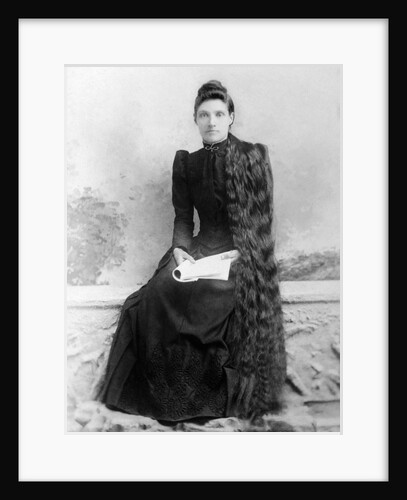 Young woman with long hair portrait, ca. 1900. by Anonymous